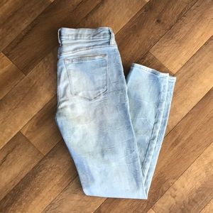 J. Crew light wash skinny jeans.